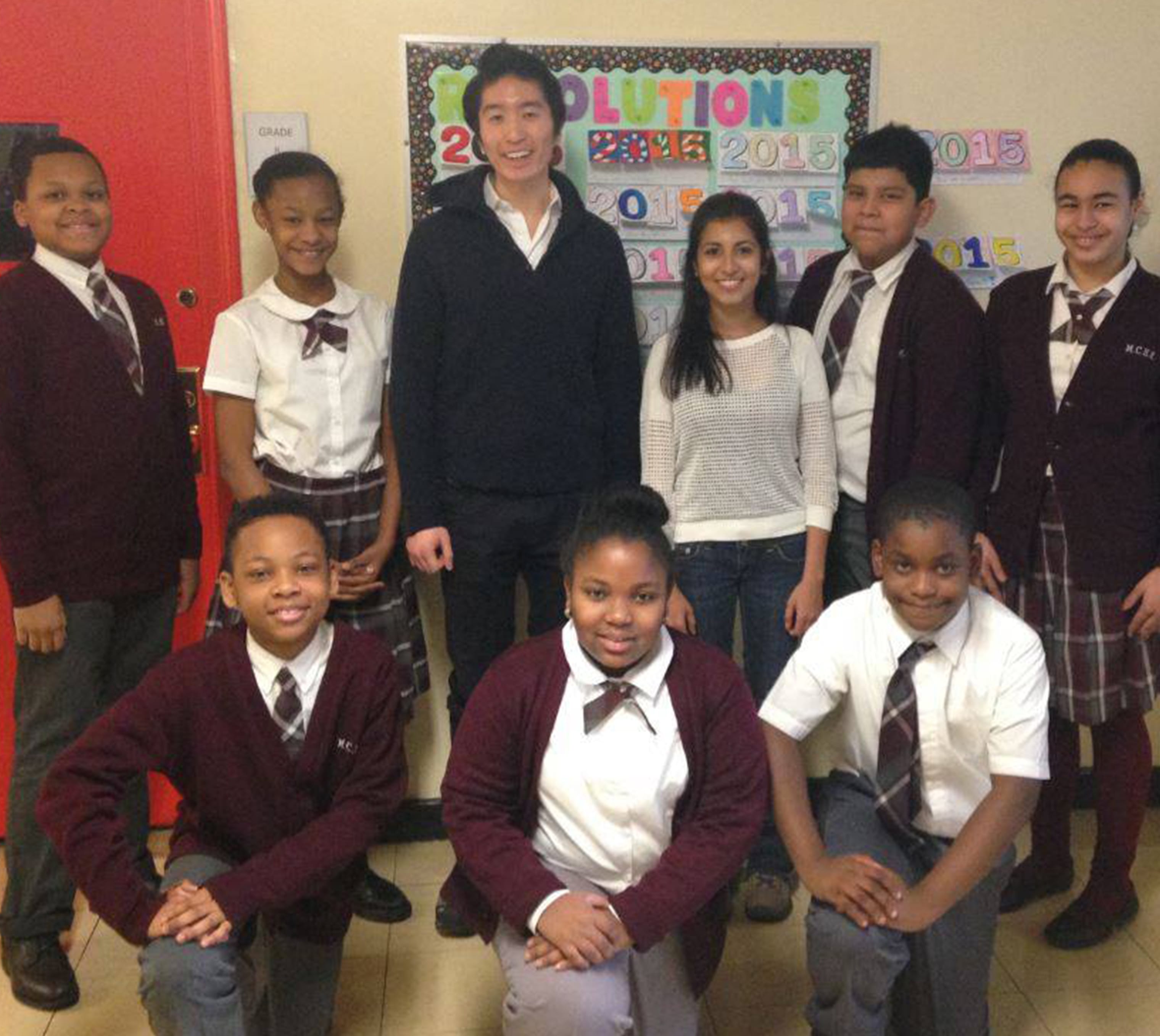 Kevin Song and Rohini Kadle (center) met with students at East Harlem's Mt. Carmel-Holy Rosary School the day before they set off for Tanzania.