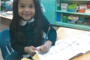 Third-grader Allison Reyes-Rodriguez is looking forward to meeting Pope Francis at Our Lady Queen of Angels School in East Harlem.