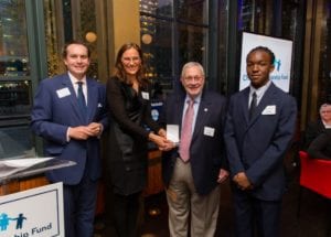 Lewis S. Ranieri (third from left) was presented with a CSF Champion for Children award by CSF board member Remy Trafelet, CSF President Darla Romfo, and CSF Scholar Jalen Monroe.